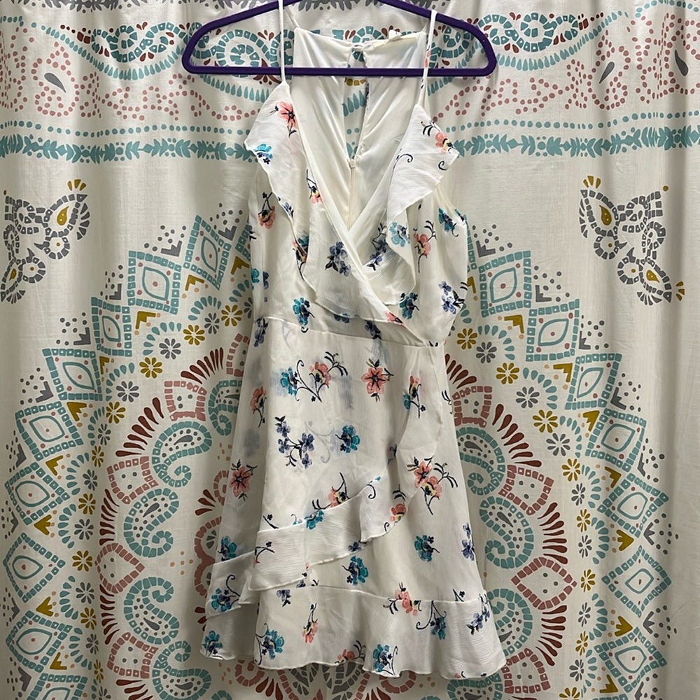 White ruffle mini dress with  colorful floral print